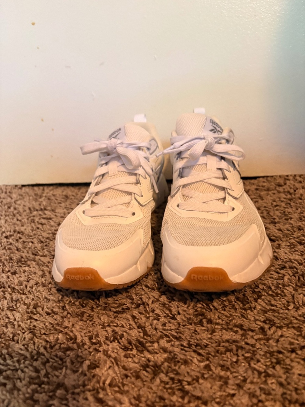 All white Reebok Trainers